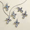 View Larger Image of Floret Cross with Blue Topaz