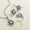 View Larger Image of Scrolled Pendant with Blue Topaz